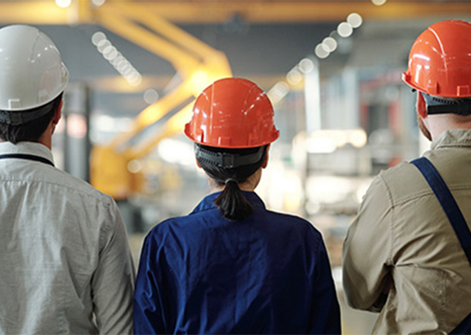Manufacturing employees in hardhats